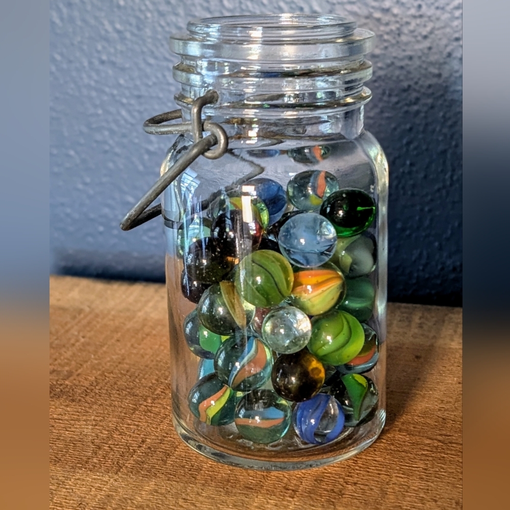 Colorful Glass Marbles in Jar